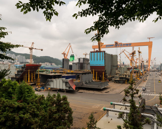 Illustration for article titled Pictures of the World's Biggest Cargo Ship Make You Feel Tiny